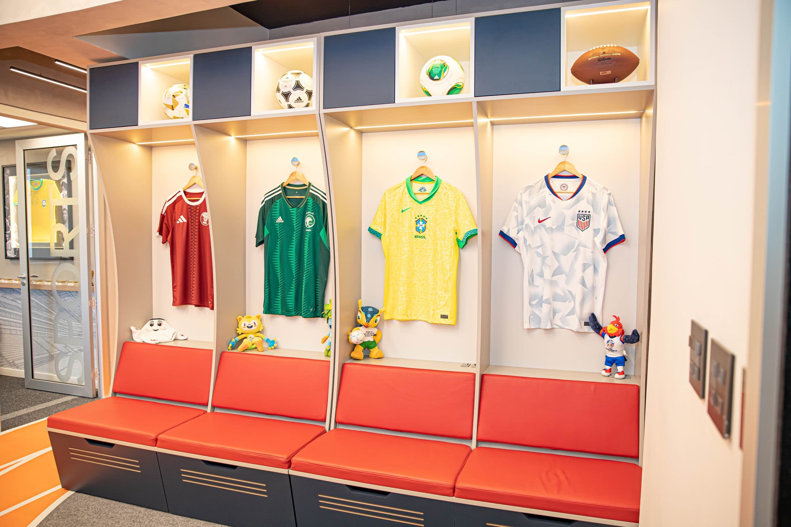 Arena project — a stadium dressing room outfitted with national-team kits